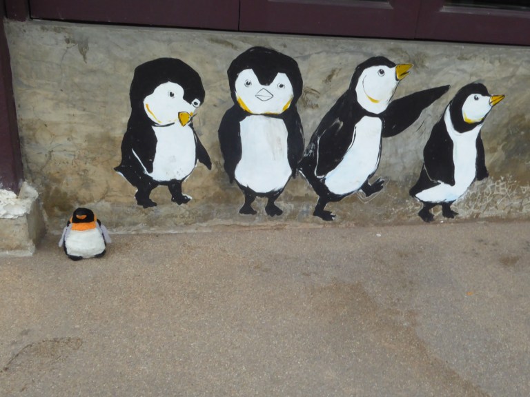 a painting of penguins